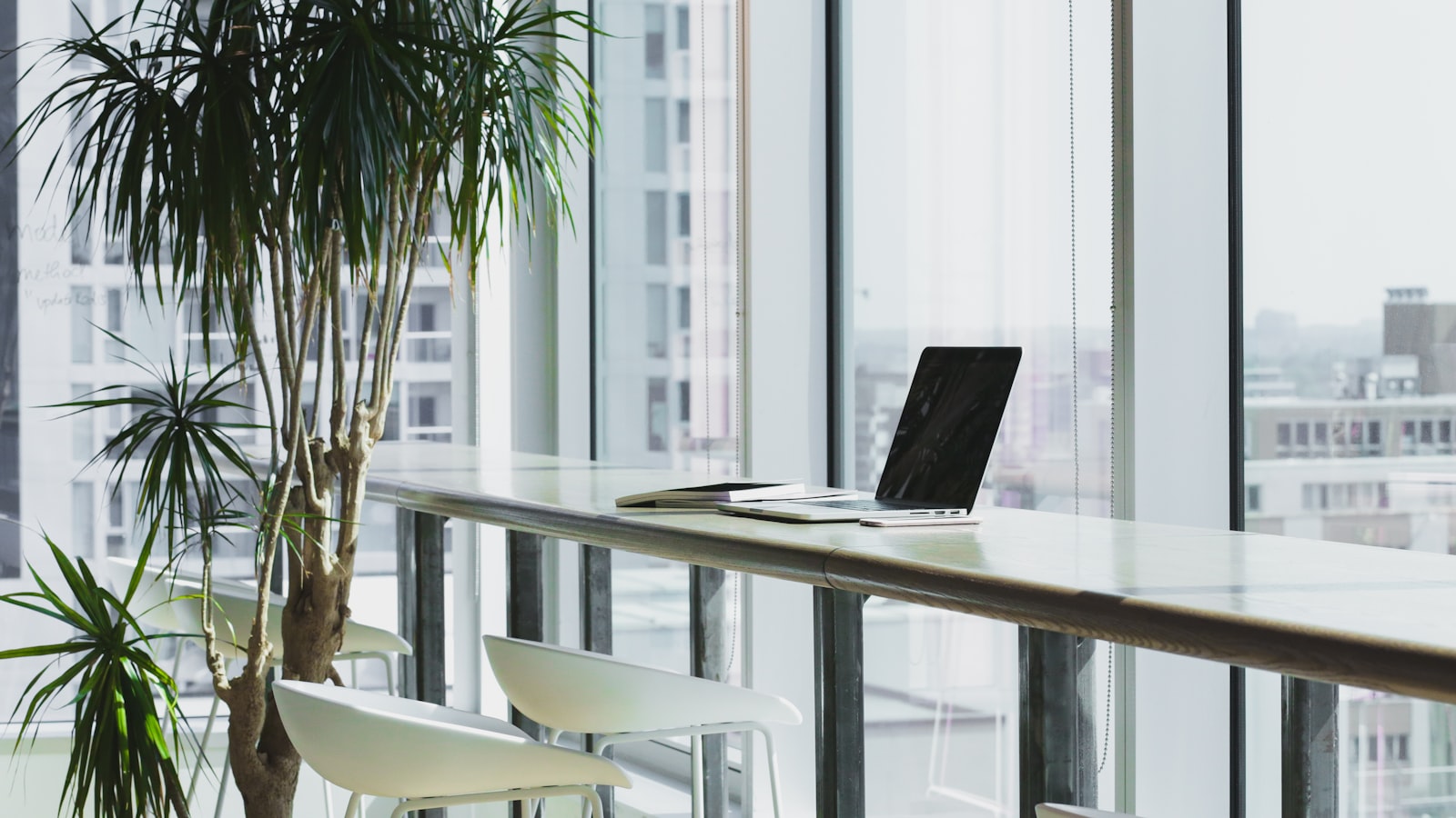Open-plan office with many screens