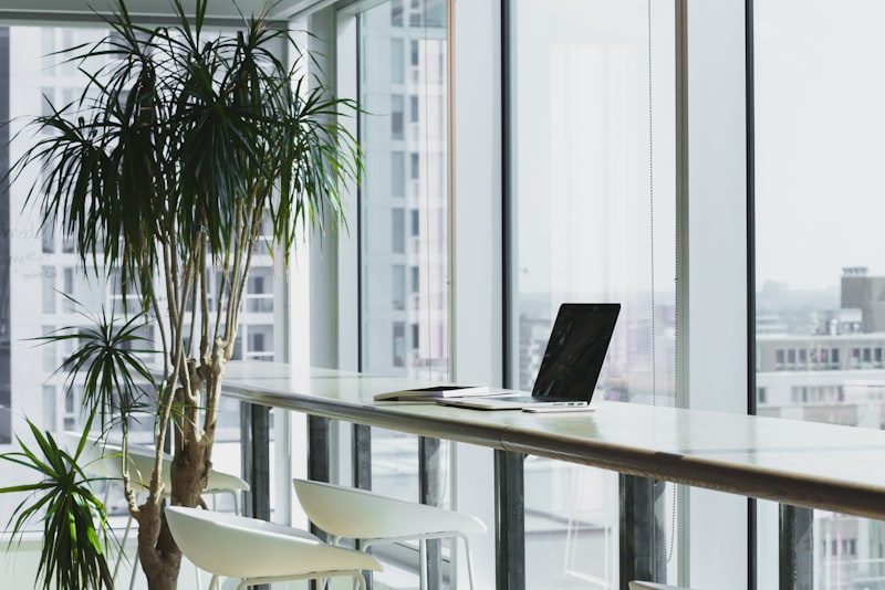 Open-plan office with many screens
