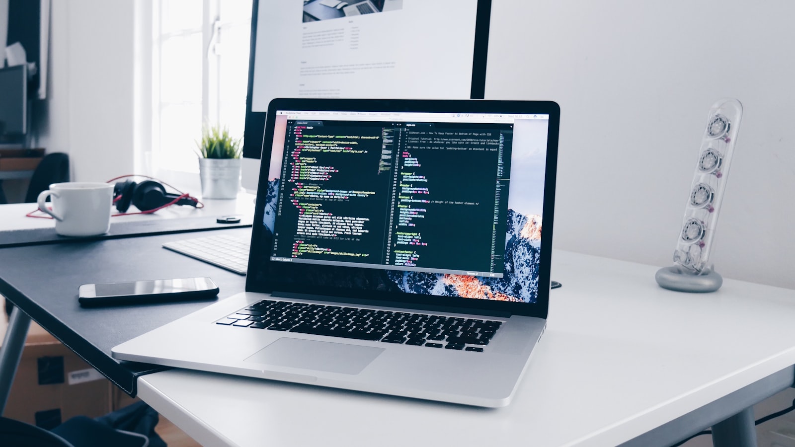 Developer comparing two note apps